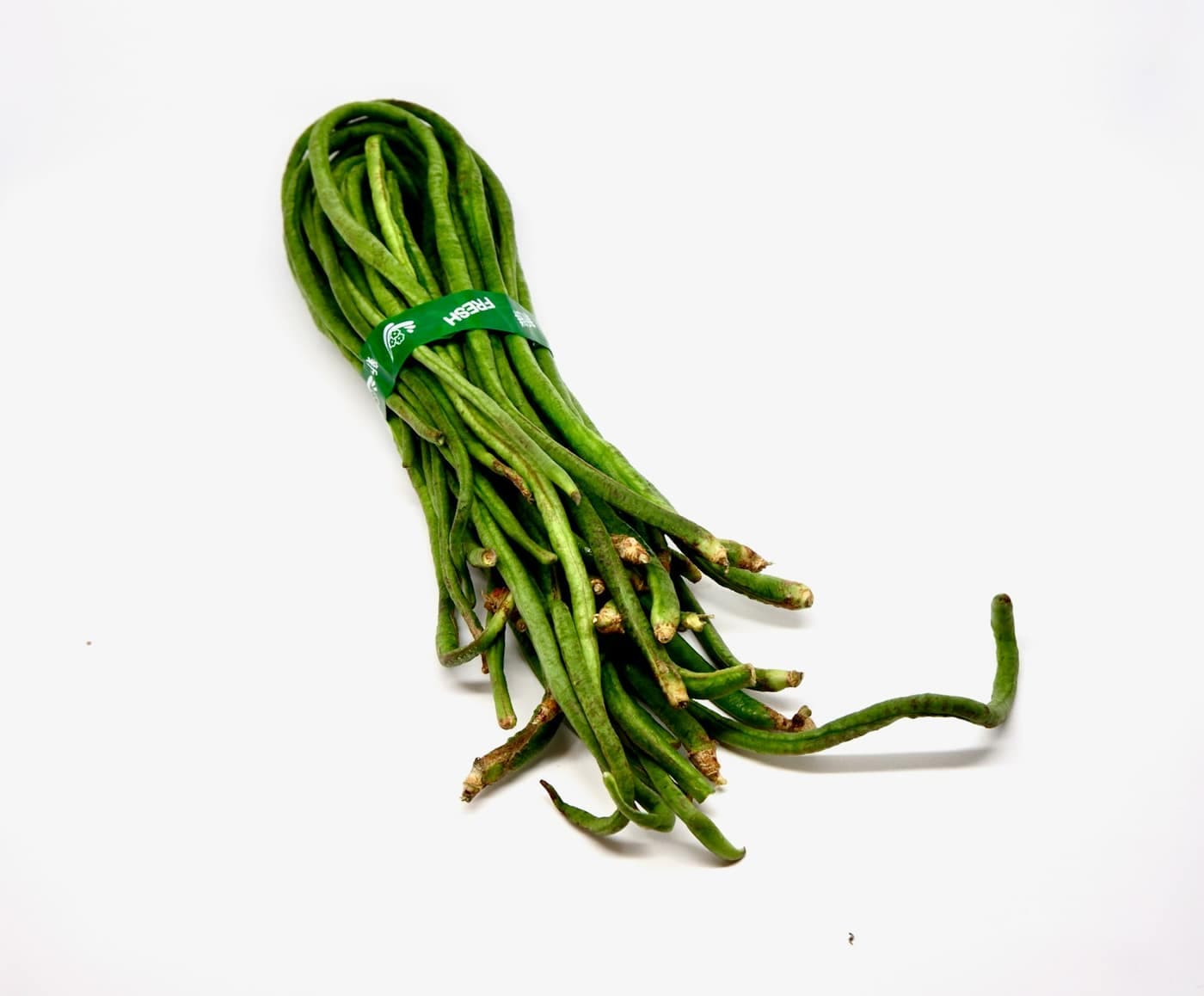 A bundle of fresh long green yardlong beans, a cowpea (lobia) subspecies of Vigna unguiculata, tied with a paper band